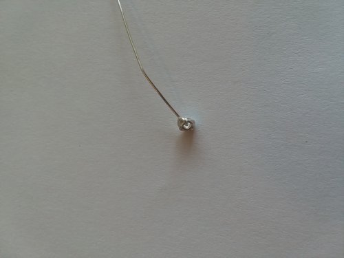 Jennifer VanBenschoten's Make a Knotted Headpin - , Findings & Components, Toggles & Clasps, Earwire & Headpin, Loops, Wire Loop, Wrapped Wire Loop, pull the tail through the knot